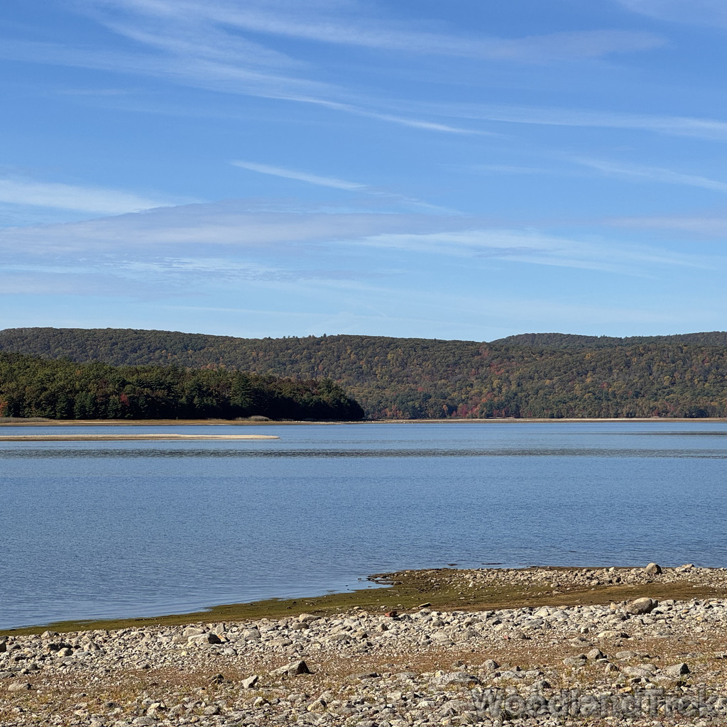 Quabbin Reservoir water view showing northern tip of Mt. L with calm water and subtle early fall color