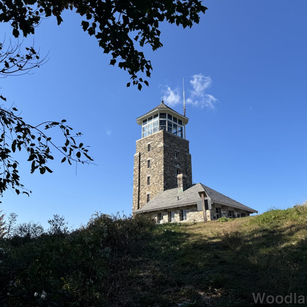 Quabbin Tower viewed from Tower Trail under a clear blue sky