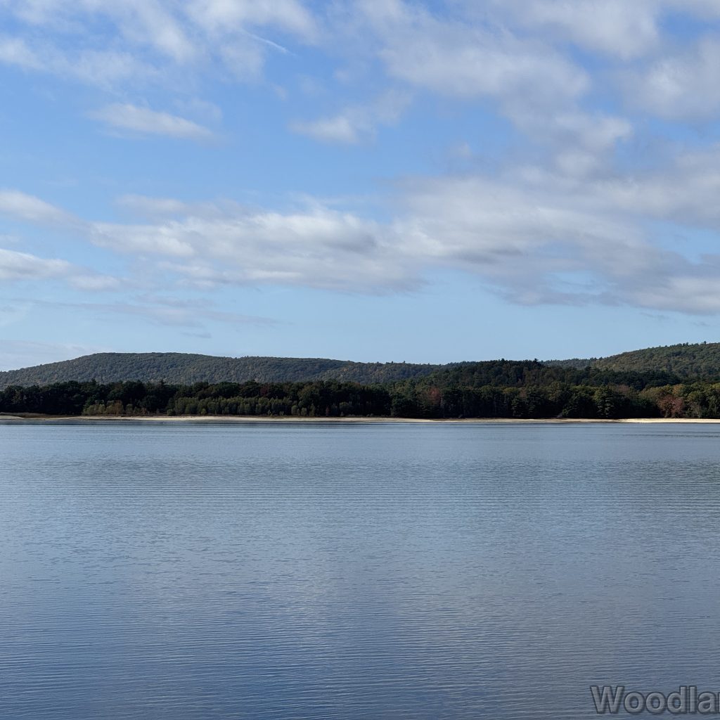 Quabbin Reservoir view from Blakington Road with calm water and distant hills