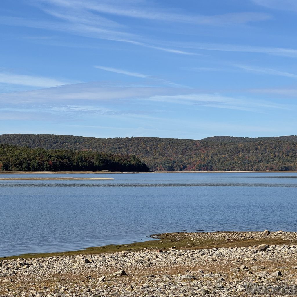 Quabbin Reservoir water view showing northern tip of Mt. L with calm water and subtle early fall color