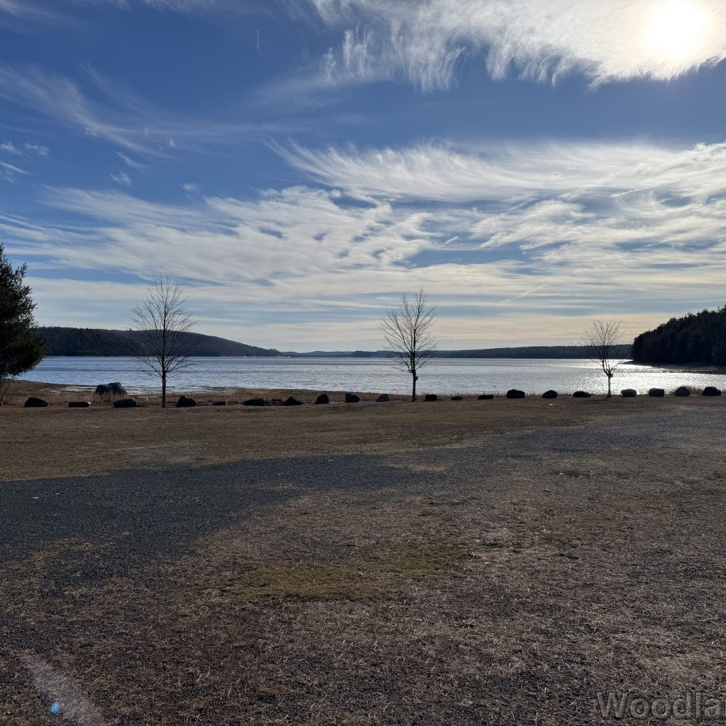 Quabbin Reservoir from Fishing Area 1 with calm water and wispy high clouds