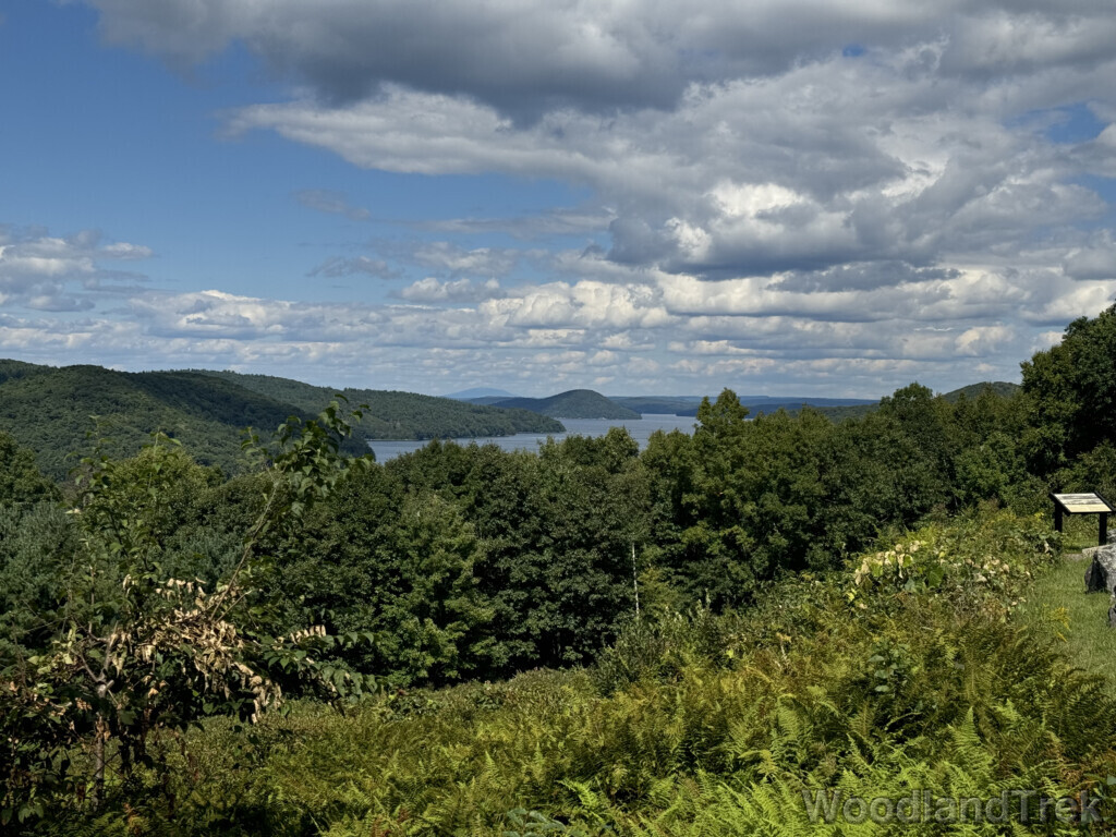 East Fork of Quabbin Reservoir viewed from Enfield Lookout, with blue water, vast forest, and Mount Monadnock in the distance