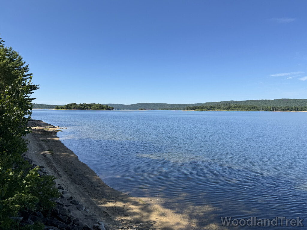 Quabbin Reservoir with extremely blue water, delicate ripples, and a small island in the distance