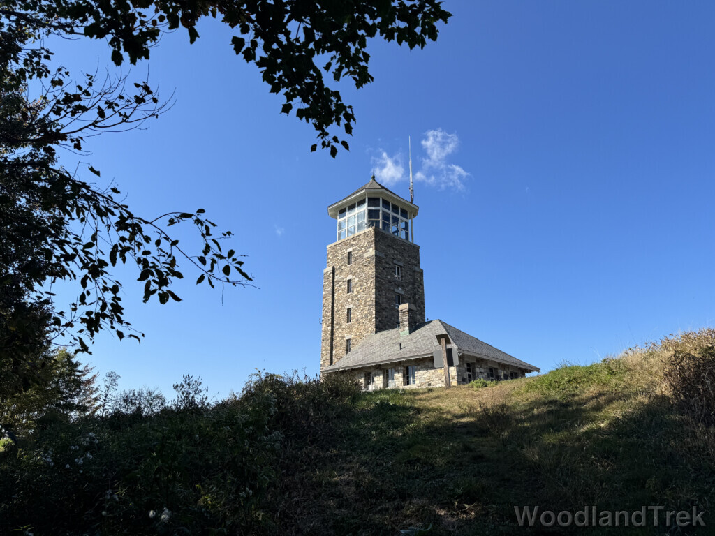 Quabbin Tower viewed from Tower Trail under a clear blue sky