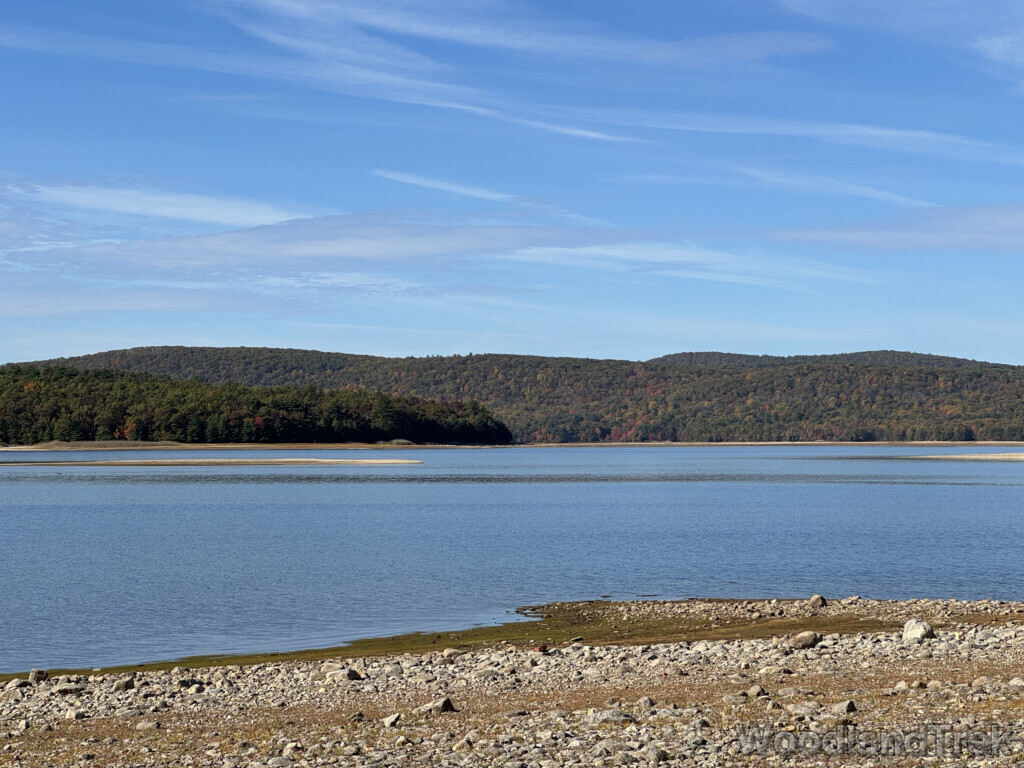 Quabbin Reservoir water view showing northern tip of Mt. L with calm water and subtle early fall color